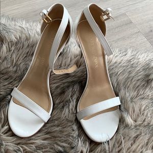 White patent leather Stuart Weitzman heels
